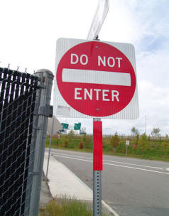 DO NOT ENTER sign application of reflective sign post panels